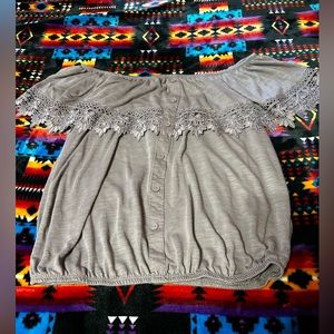 Crop lace off the shoulder.